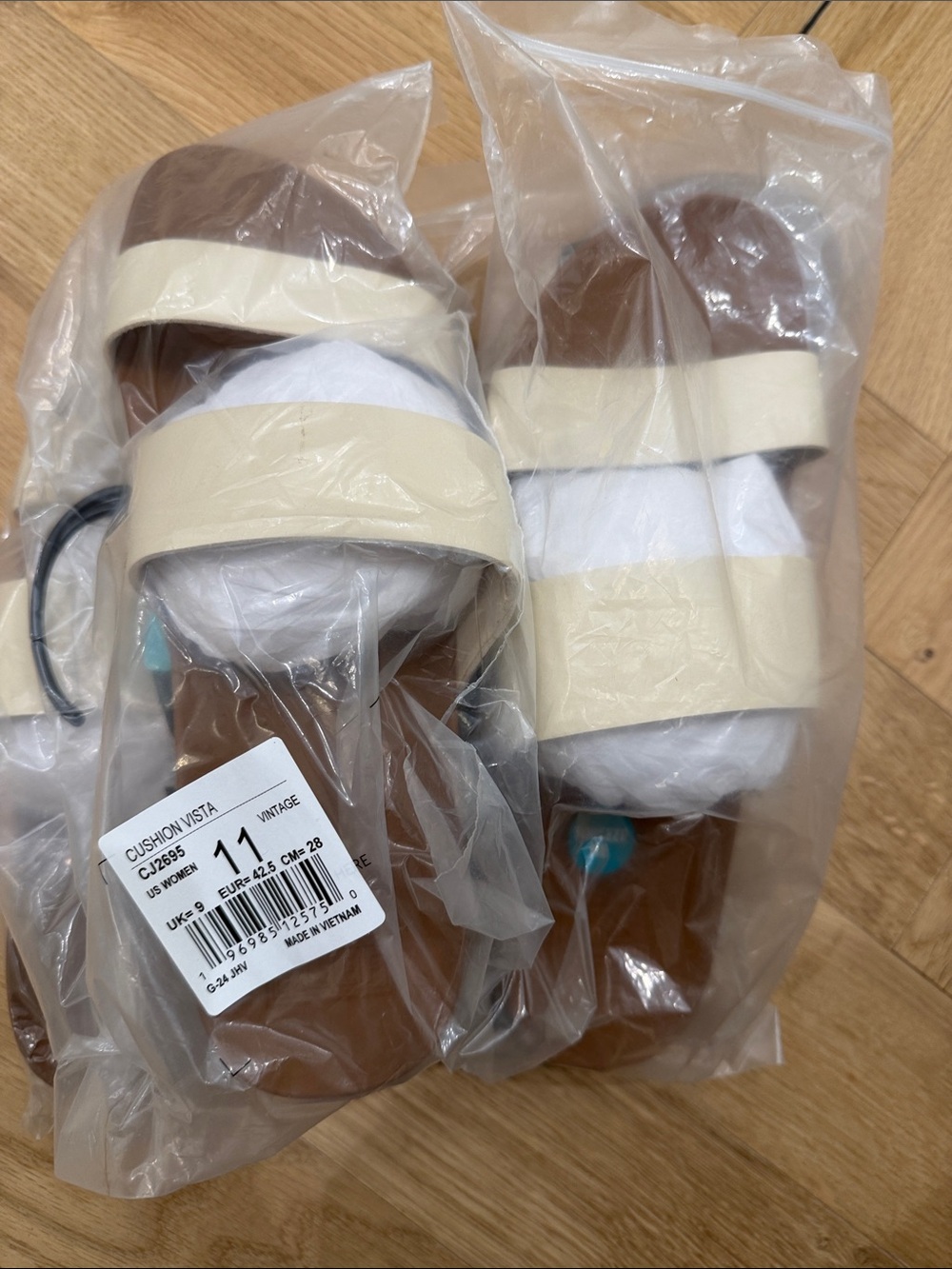 Reef Women's Two-Strap Cream and Brown Slide Sandals
